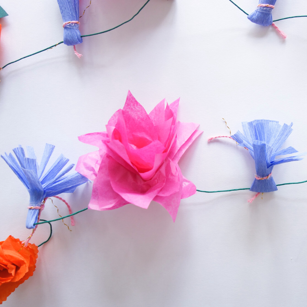 Close up of lotus tissue paper flower on Lotus Garland