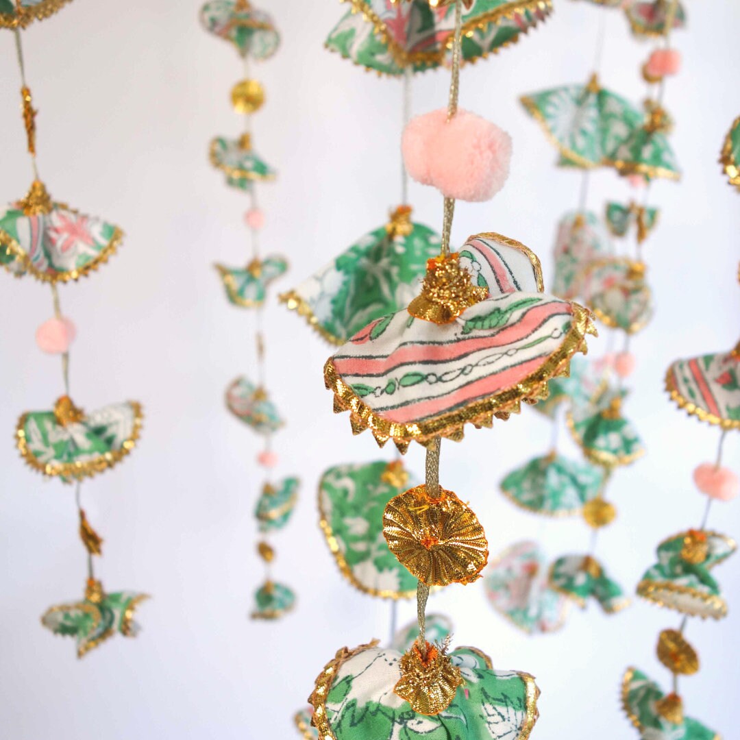 Close up of pink pattern on the Sage Garden hanging garland