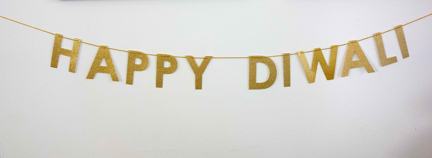 Happy Diwali banner in gold letters and modern font